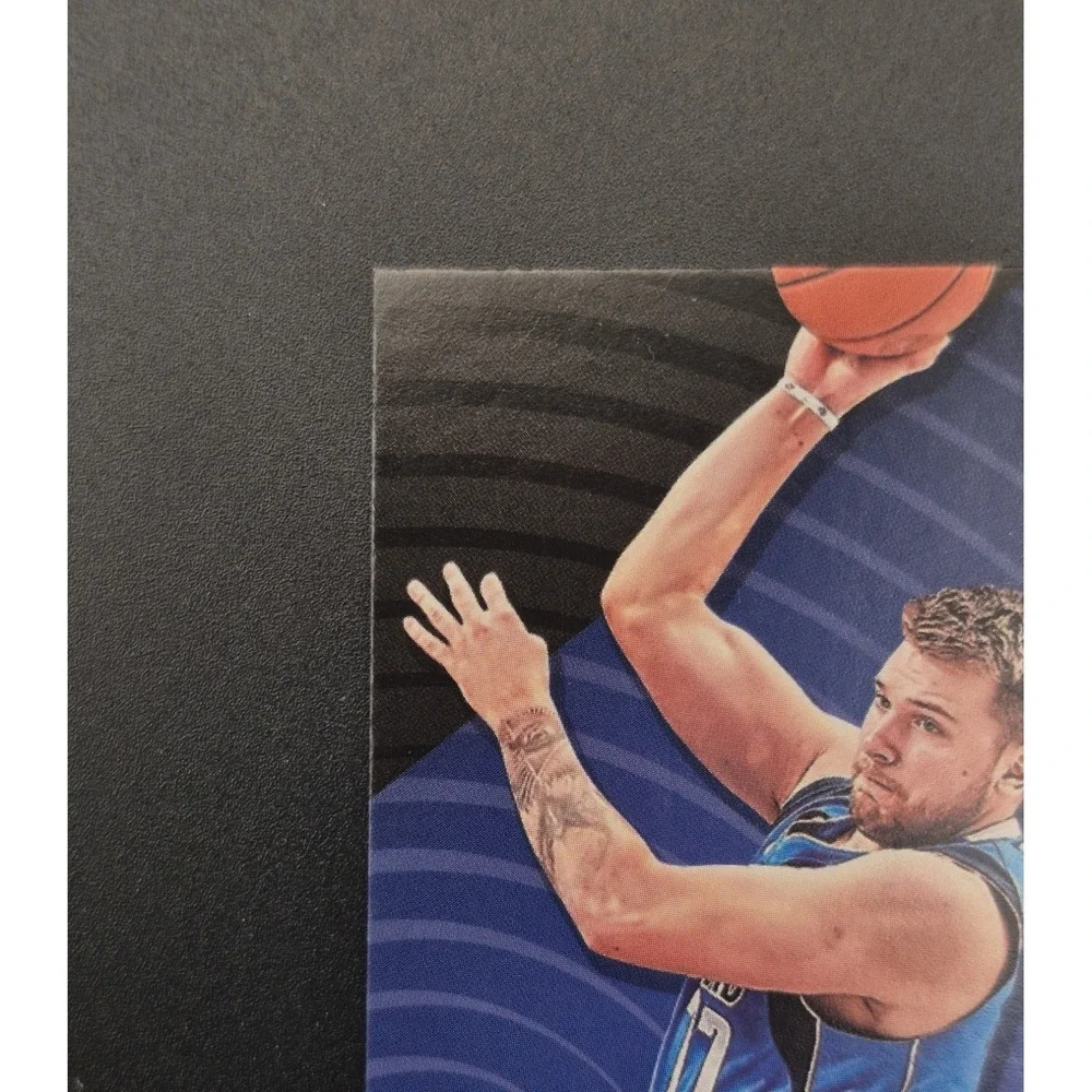 2022-23 Panini Revolution Luka Dončić #3 ‎ Shockwave Cosmic Blue /99 Mavs Lakers
